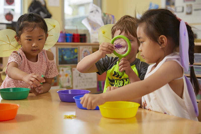 Children playing at a table